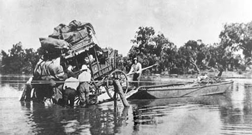 Cobb and Co stuck in flood